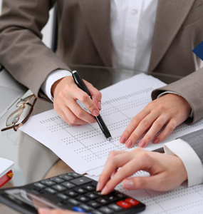 Using calculator on a desk